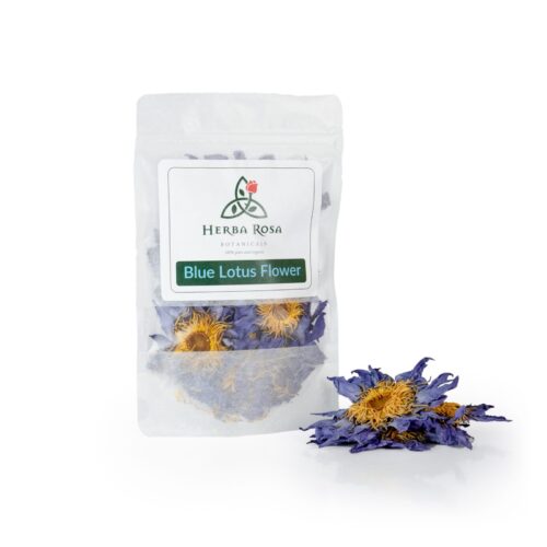 A bag of blue lotus flowers from Herba Rosa, with some flowers sitting on the surface in front of it, all in front of a white background.